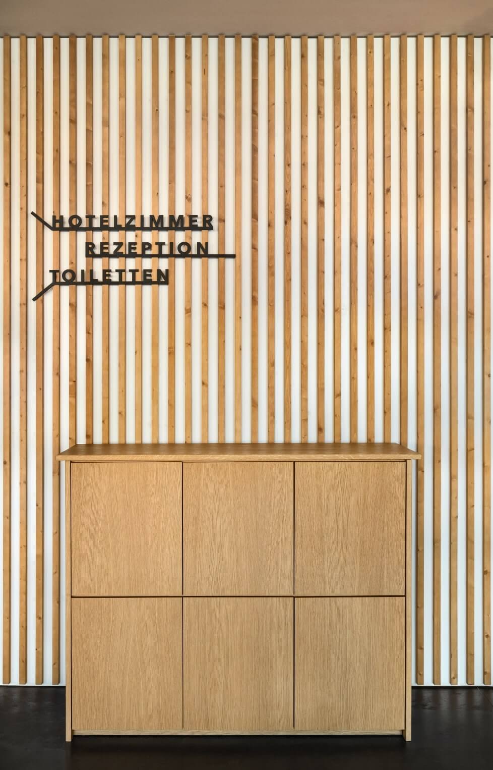 Guest experience oak furniture in the lobby area.