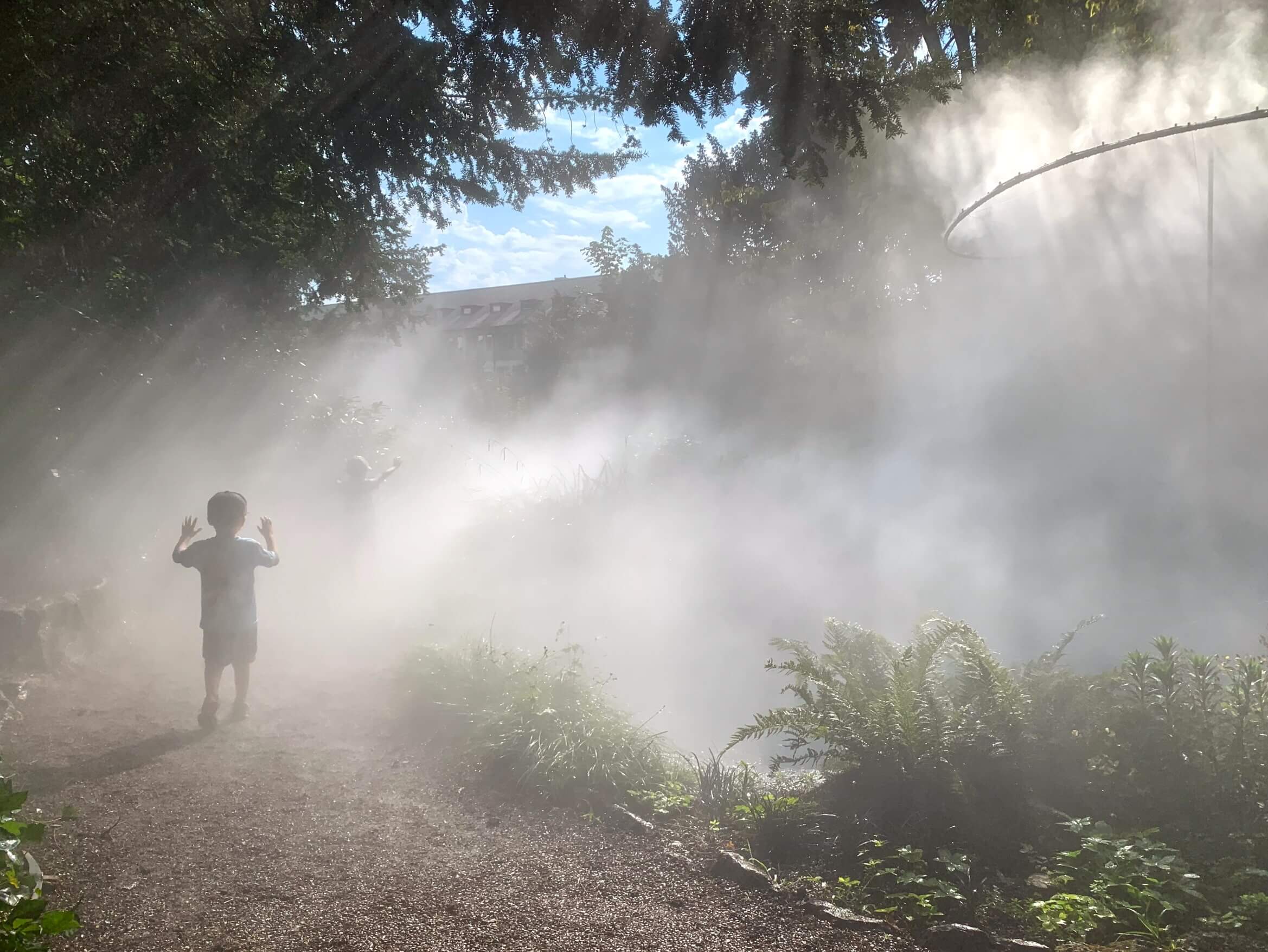 Ethereal experience in Zurich's cloud mist architecture installation.