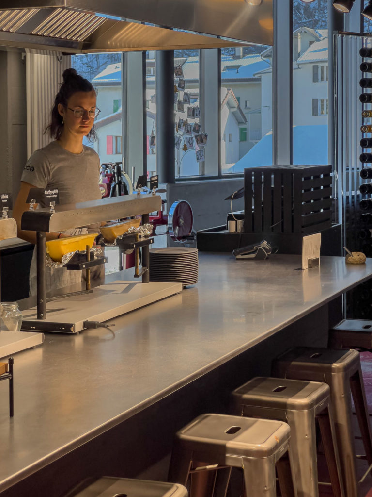 Cheese Raclette Counter at the Heart of Shop Design