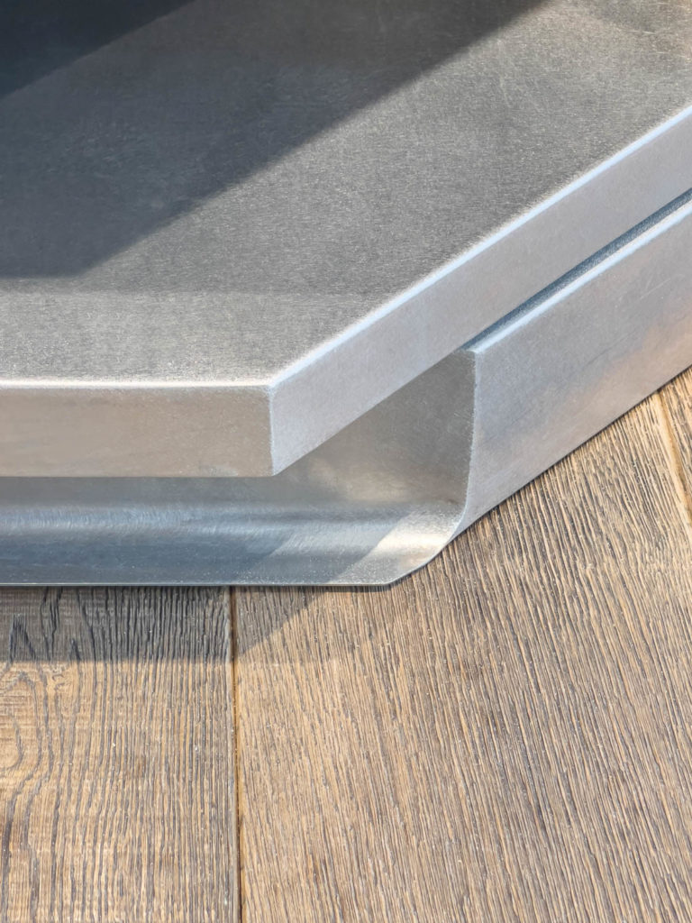 Inox Detail in Cheese Shop Design