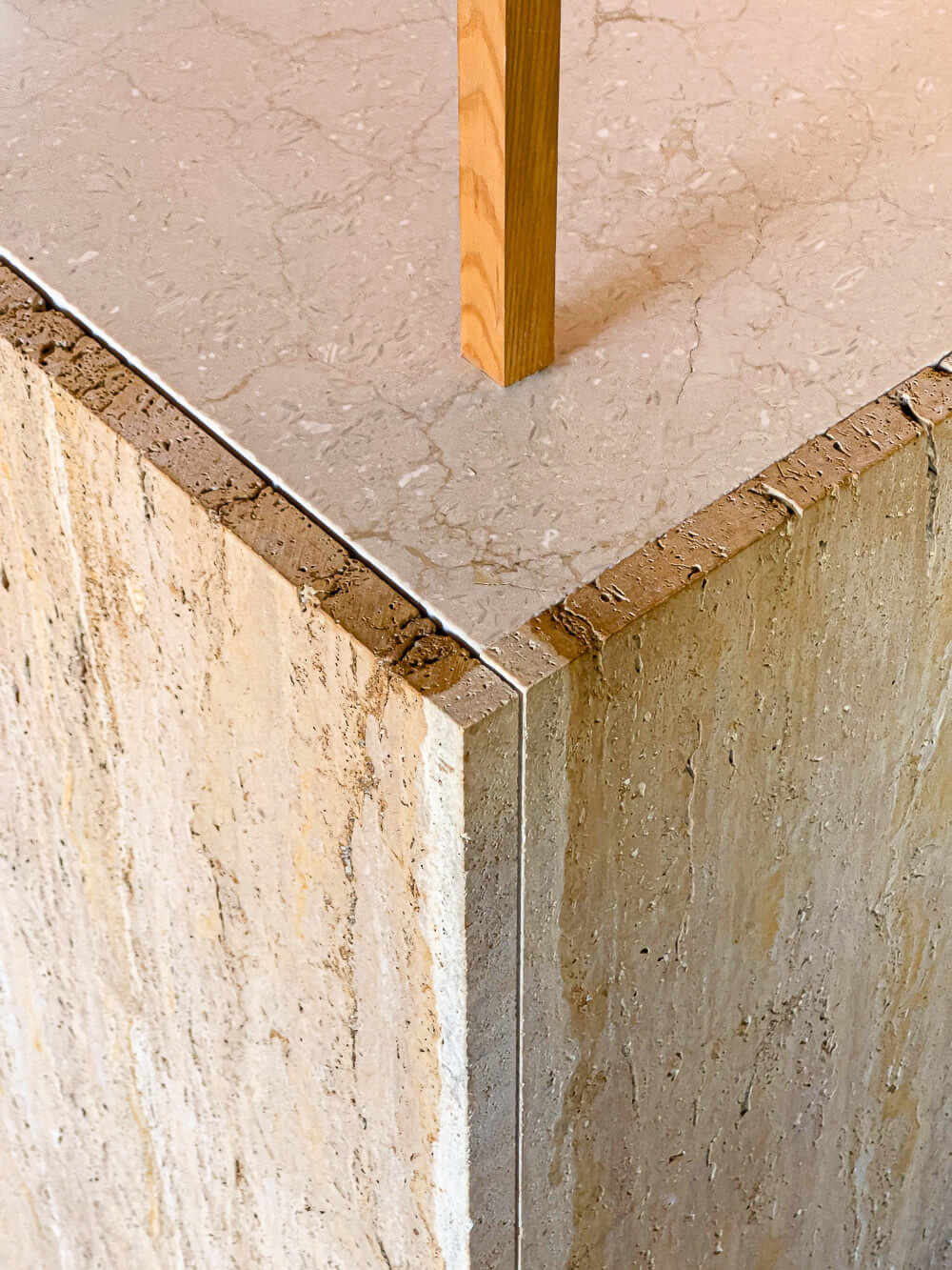 Elegant Travertine Details in Pastel Design Bakery