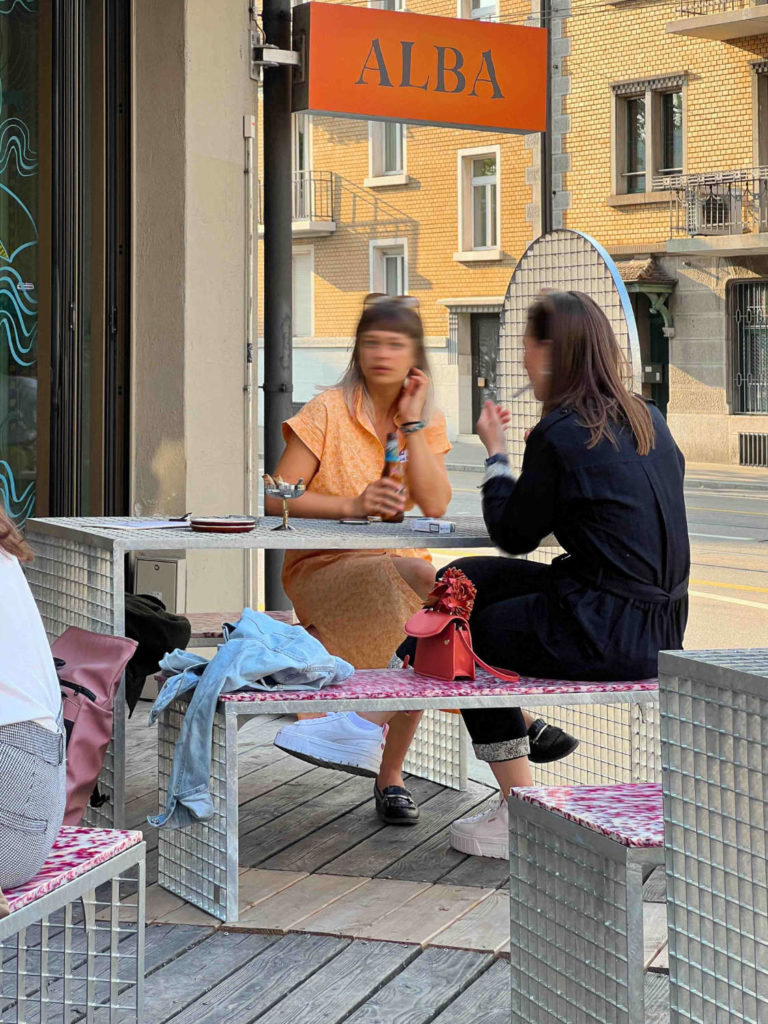 Gabion metallic furniture in HOXAR STUDIO's pizzeria restaurant design.