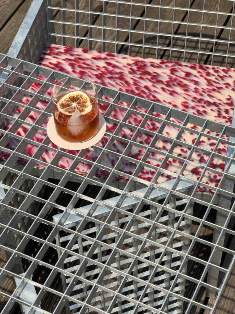 Distinctive Negroni table in HOXAR STUDIO's pizzeria restaurant design.