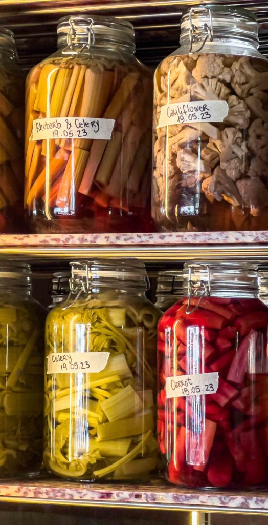 Recycled shelves in HOXAR STUDIO's pizzeria restaurant design.
