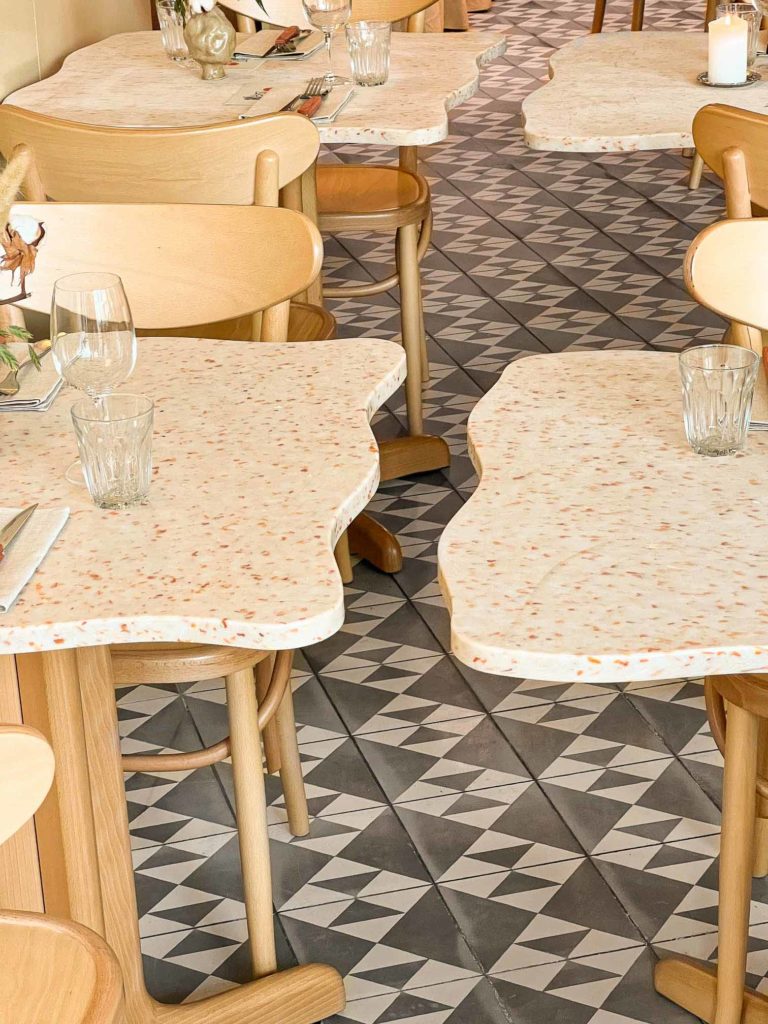 Artistic wave table in HOXAR STUDIO's pizzeria restaurant design.